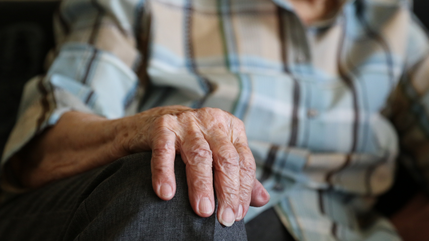 Nurse helping patient in Respite Care